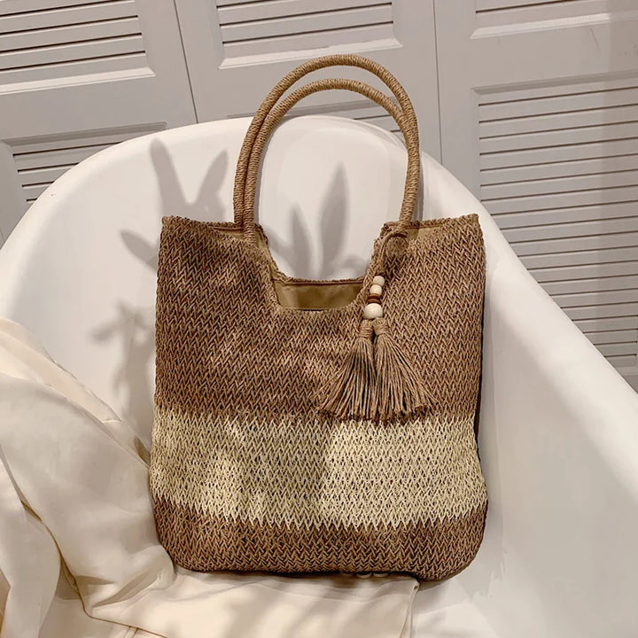 Sac en paille femme, grand fourre-tout estival, accessoire de plage tendance.