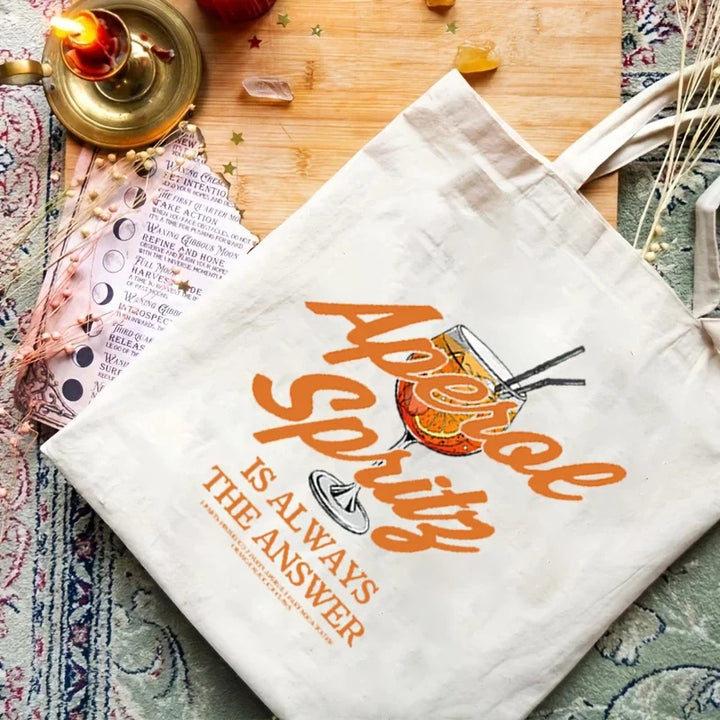 Sac fourre-tout femme en toile légère et résistante, imprimé motifs cocktails. Design tendance, parfait pour l'été.