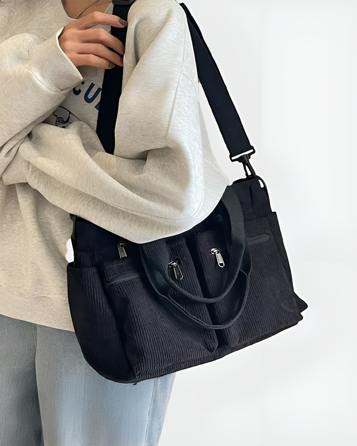 Sac bandoulière femme en velours côtelé. Léger, élégant et zippé, parfait comme organisateur quotidien.