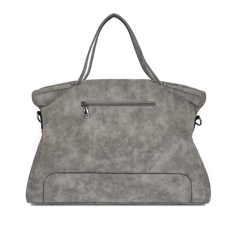 Sac de cours femme spacieux avec compartiments. Simili-cuir élégant, parfait pour une bonne organisation.