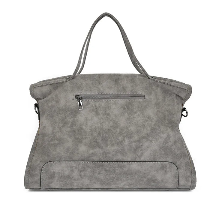 Sac de cours femme spacieux avec compartiments. Simili-cuir élégant, parfait pour une bonne organisation.