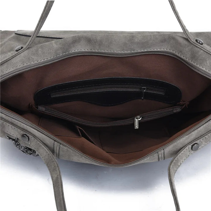 Sac d'épaule femme confortable, bandoulière ajustable. Fourre-tout spacieux pour cours et rentrée.