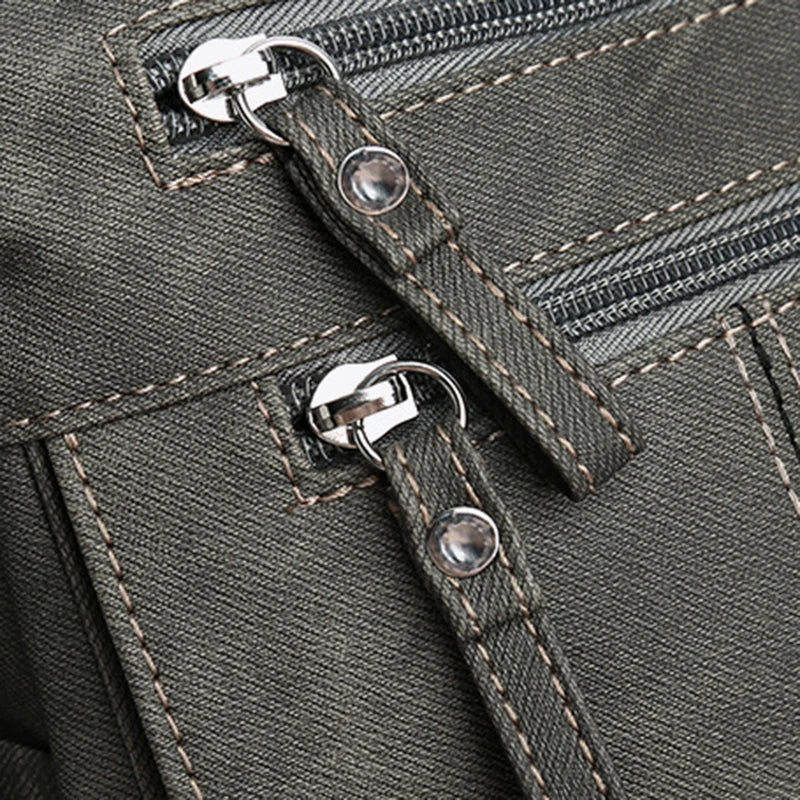 Sac fourre-tout femme tendance, bandoulière ajustable. En toile durable, parfait pour un style mode et décontracté.