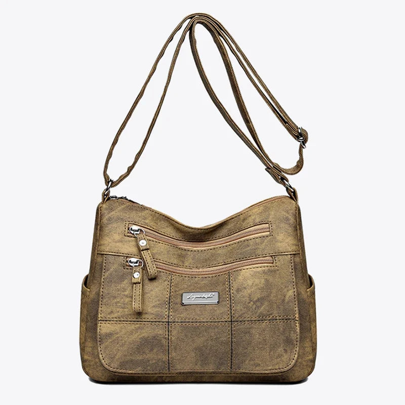 Grand sac fourre-tout femme en toile, bandoulière ajustable. Pratique pour le travail ou les loisirs.