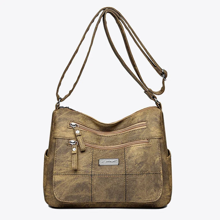 Grand sac fourre-tout femme en toile, bandoulière ajustable. Pratique pour le travail ou les loisirs.