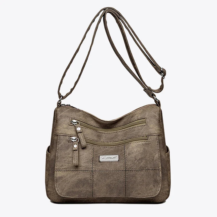 Sac à main femme style fourre-tout, bandoulière. En toile résistante, parfait accessoire mode et pratique.