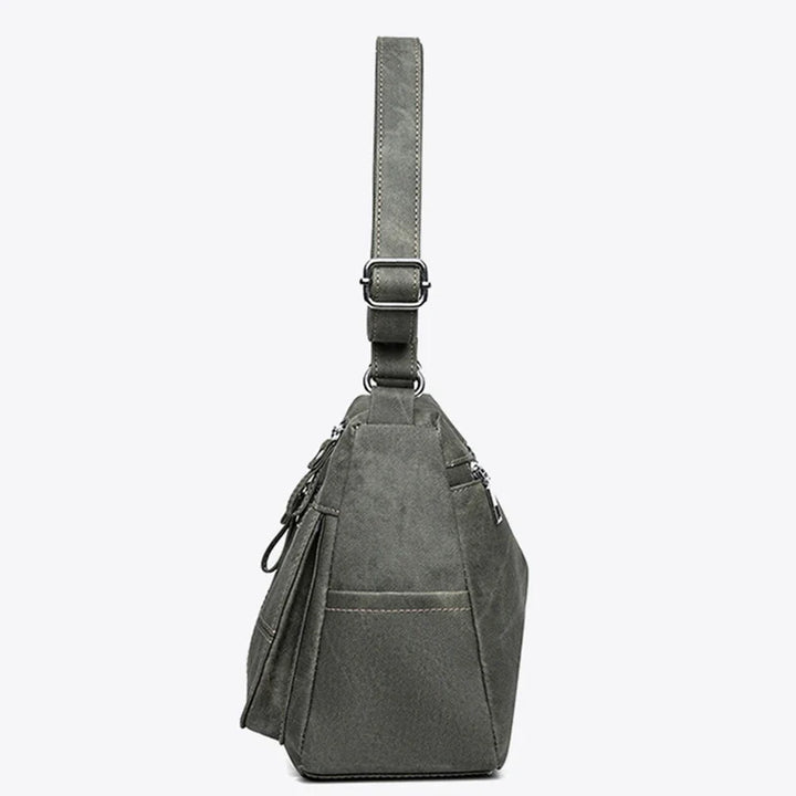 Sac fourre-tout en toile pour femme, bandoulière confortable. Un accessoire élégant et pratique au quotidien.