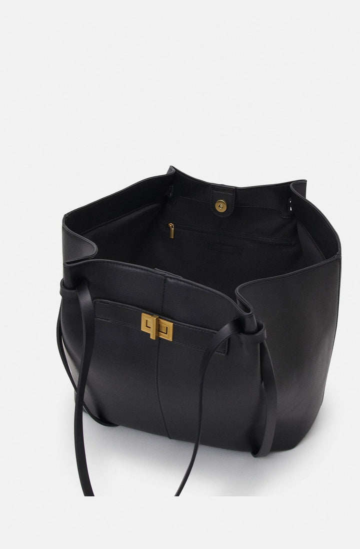 Sac fourre-tout chic et tendance pour femme, en cuir synthétique avec anse longue.