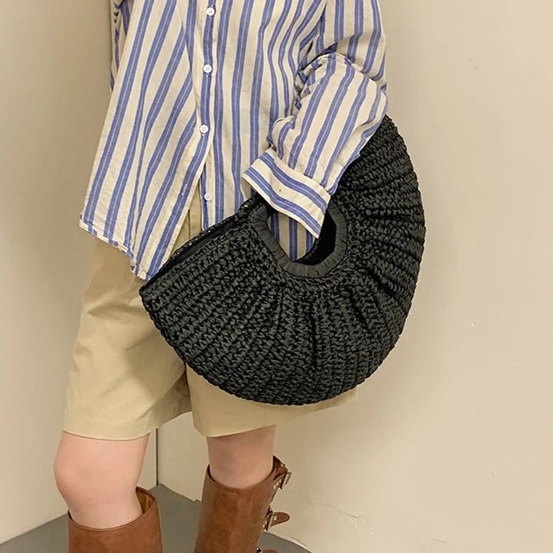 Sac Anja en paille tissée pour femme, un incontournable pour l'été, accessoire mode chic et pratique.