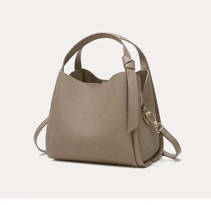 Sac femme Astride en cuir grainé marron, bandoulière ajustable, look mode et intemporel