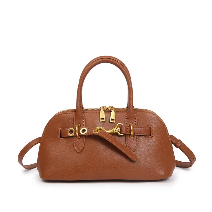 Sac maroquinerie Lyra en cuir, vue du dessous, protection et stabilité