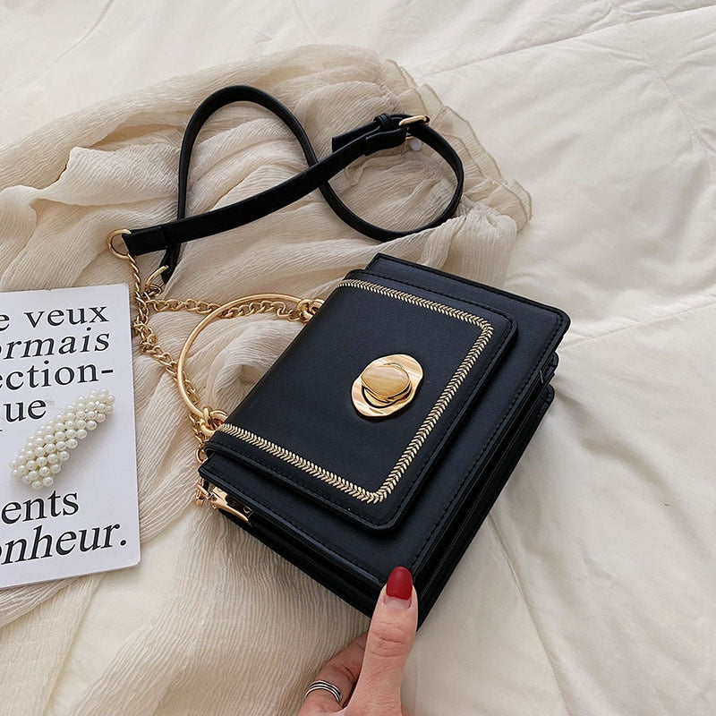 Sac bandoulière femme Giulia en cuir, forme carrée, avec anse chaîne dorée, parfait pour un cadeau