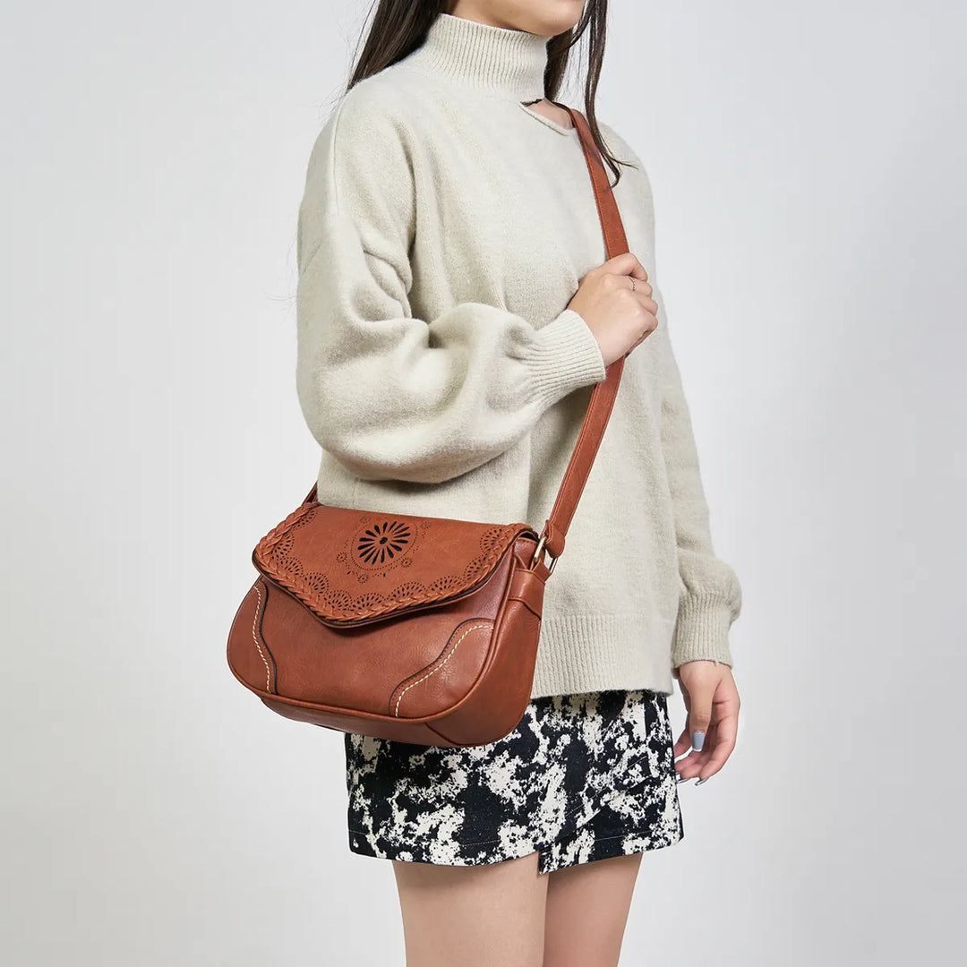 Sac à main bohème femme en similicuir, chic et pratique, avec bandoulière réglable.