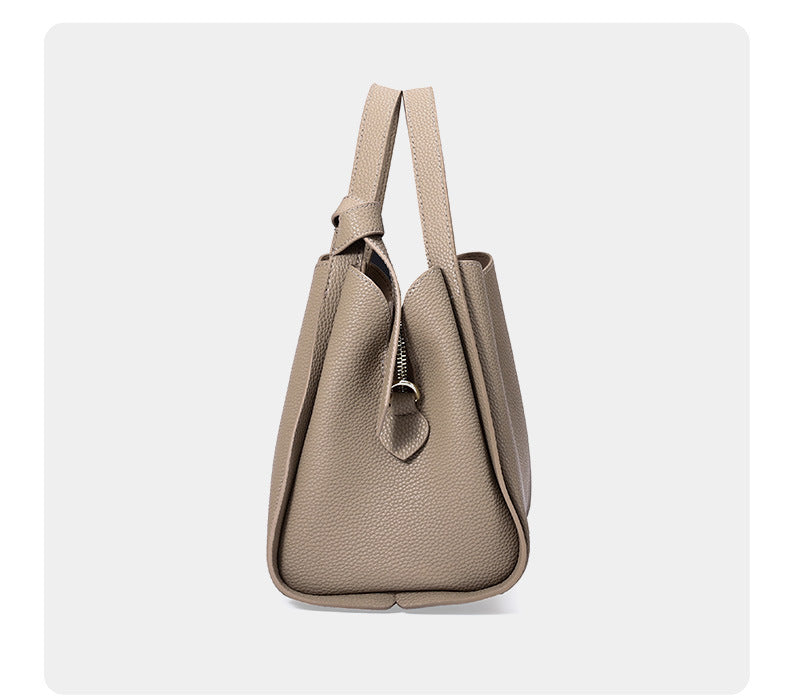 Élégant sac à main en cuir pour femmes, style intemporel. Accessoire mode indispensable pour toute tenue.