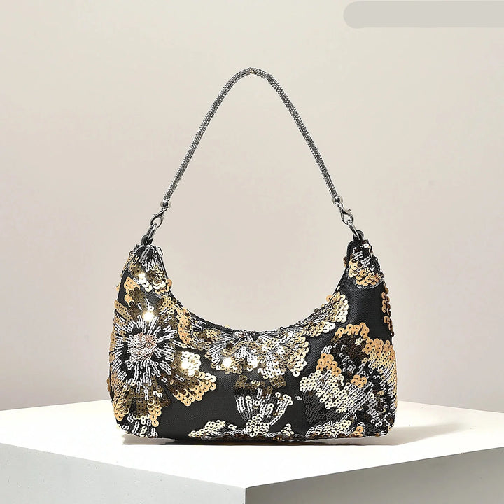 Sac à main d'été femme avec un design brodé unique et des détails scintillants en sequins. Accessoire chic et tendance.
