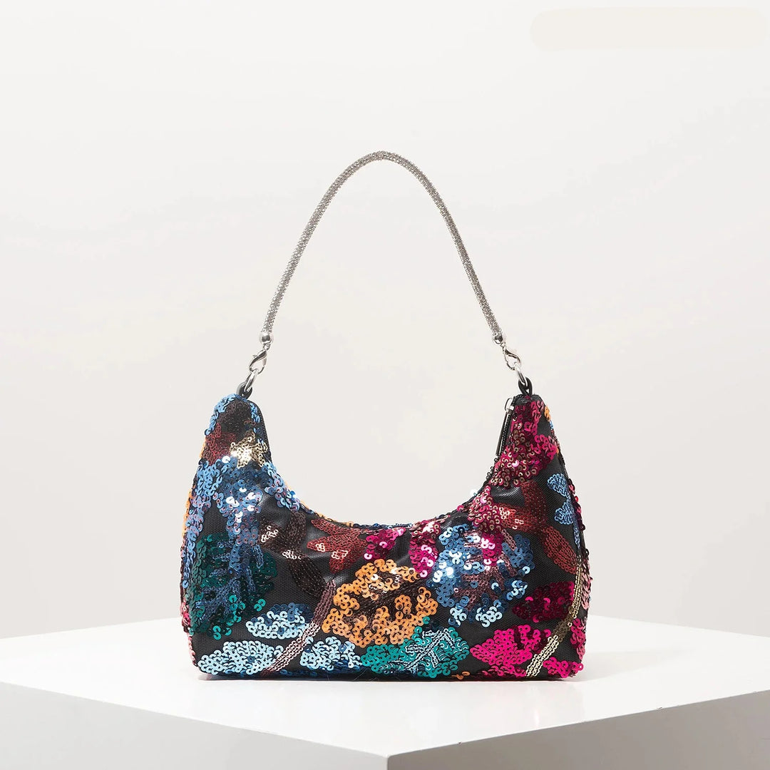 Sac à main d'été brodé et scintillant, l'accessoire femme chic et tendance par excellence pour vos sorties estivales.
