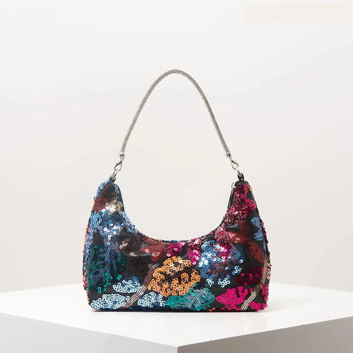 Sac à main d'été brodé et scintillant, l'accessoire femme chic et tendance par excellence pour vos sorties estivales.