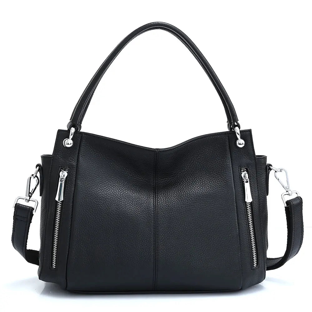 Sac à main de luxe noir en cuir grainé pour femmes, élégant et sophistiqué avec bandoulière réglable.