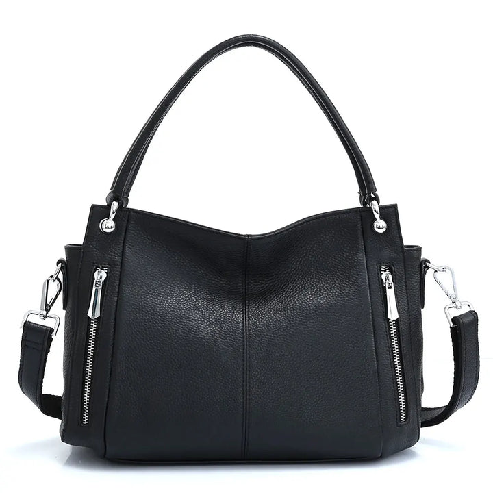 Sac à main de luxe noir en cuir grainé pour femmes, élégant et sophistiqué avec bandoulière réglable.
