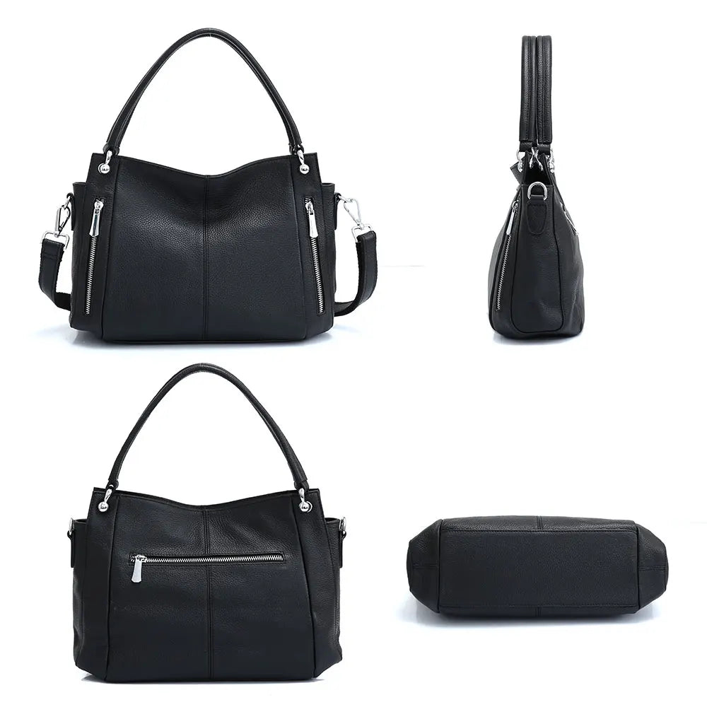 Sac femme noir en cuir grainé, accessoire de mode intemporel, idéal pour un look chic et raffiné.