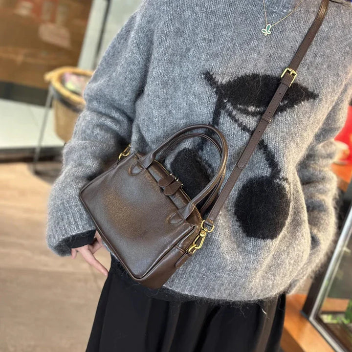 Sac femme en cuir PU noir, design élégant, parfait pour usage quotidien ou soirée.