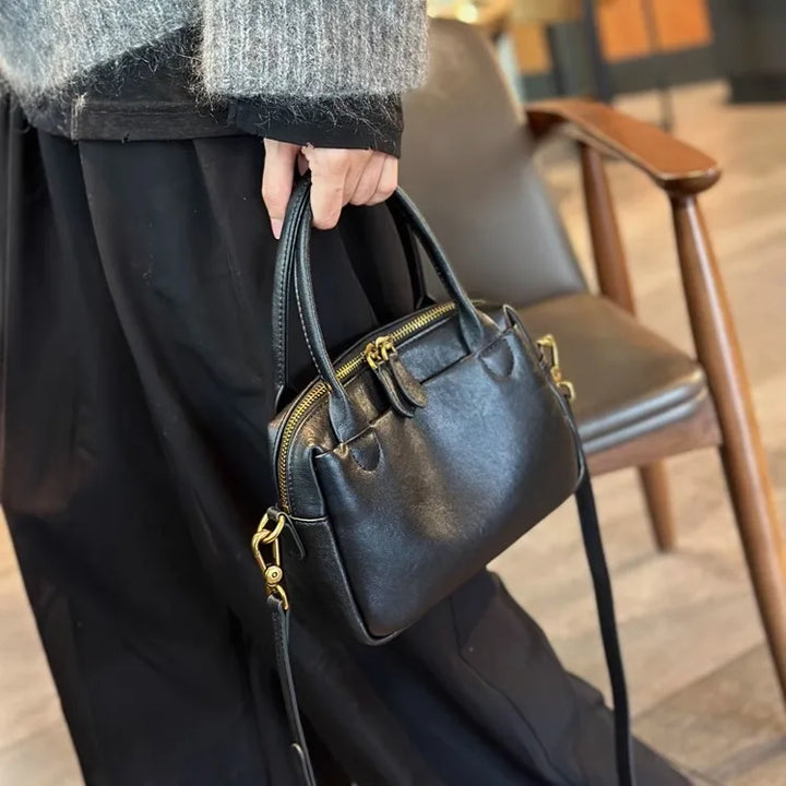 Sac luxe femme pratique, avec poignée supérieure et bandoulière, en cuir PU durable.