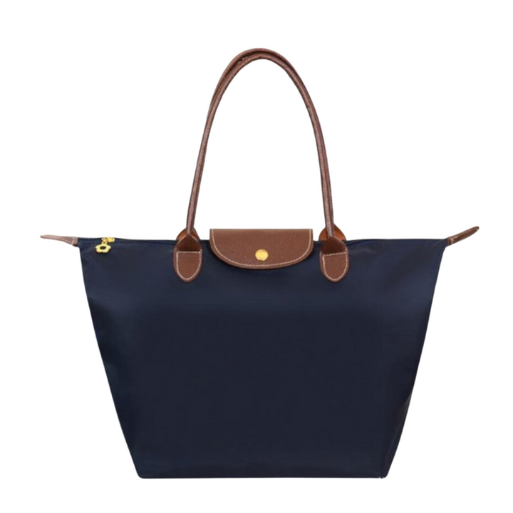 Sac à main femme intemporel et polyvalent, accessoire de luxe pour un look toujours élégant.