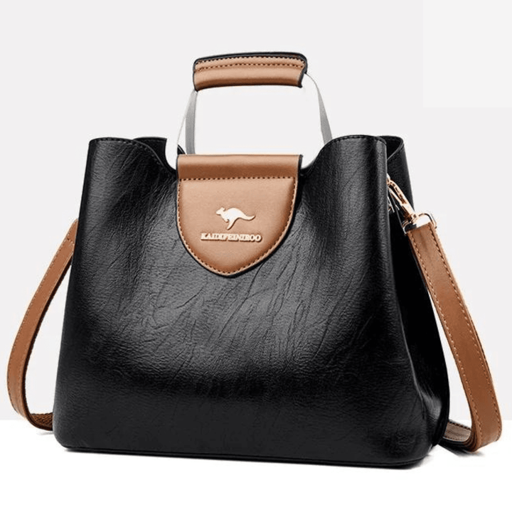 Vue arrière du sac à main en cuir pour femme, poche zippée discrète pour plus de sécurité.