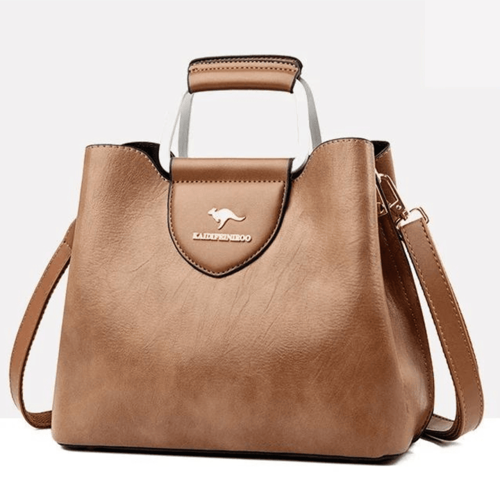 Un sac à main en cuir classique pour femme, élégant et durable, parfait pour un usage quotidien.