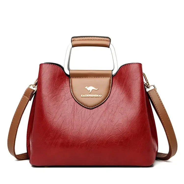 Sac à main en cuir noir pour femme, vue latérale, mettant en valeur son design épuré.
