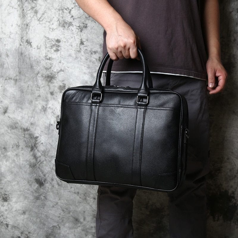 Sac de travail en cuir pour homme, design intemporel noir, parfait pour les professionnels organisés