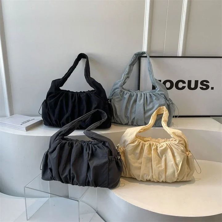 Sac femme en nylon, moderne et chic, parfait pour le quotidien ou les sorties mode.