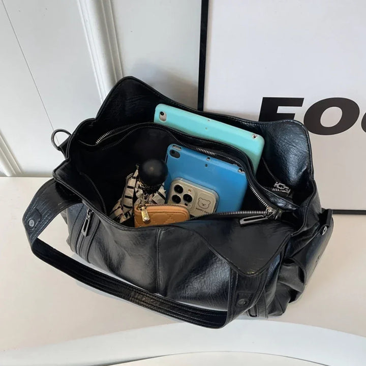 Sac Aliona femme avec multiples compartiments intérieurs, idéal pour une organisation optimale.