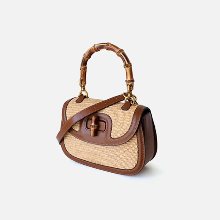Sac à main bandoulière femme en paille et cuir marron, accessoire d'été chic et pratique au look naturel.