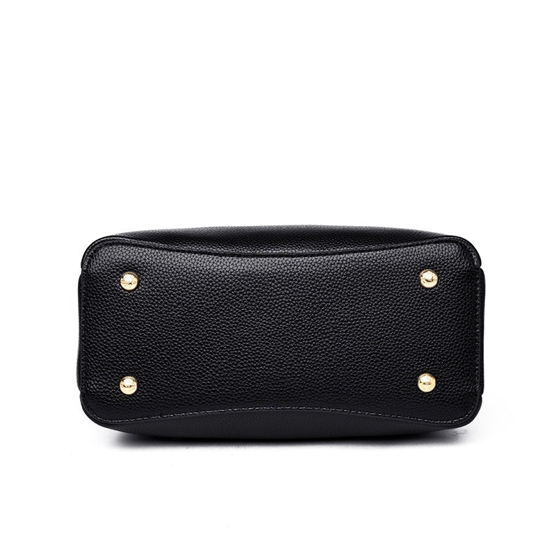 Sac à main noir spacieux et élégant pour femme, en cuir synthétique, un classique intemporel.