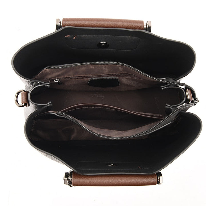 Sac de luxe femme, motif croco bicolore, accessoire mode raffiné, élégance.