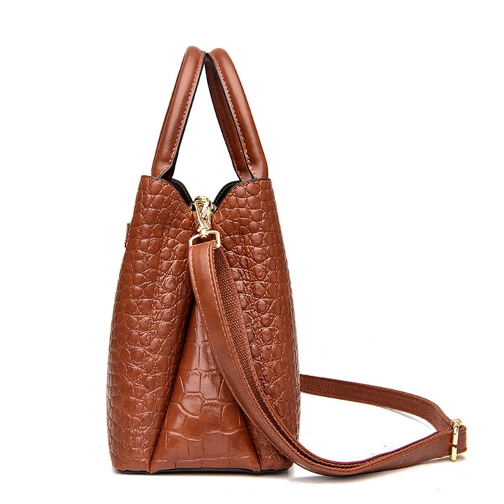Accessoire mode: sac à main femme effet croco en cuir synthétique. Design élégant et structuré, noir intemporel.