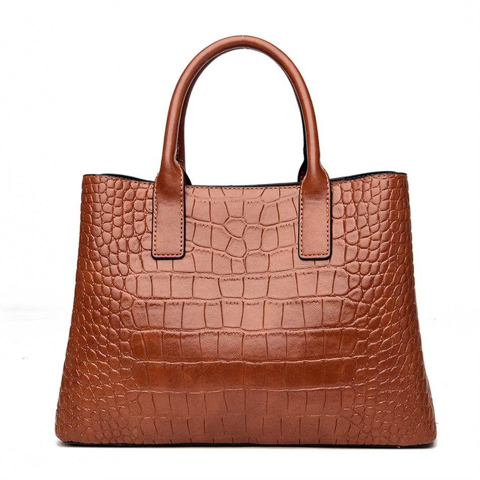 Sac à main effet croco femme, design moderne et chic. Cuir synthétique résistant, idéal comme sac quotidien.