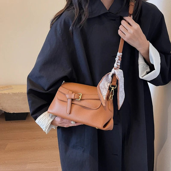 Sac à main femme en cuir PU, texture lisse, style luxe, accessoire polyvalent pour un usage quotidien.