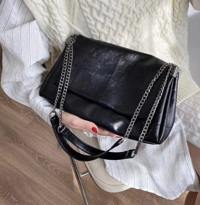 Sac bandoulière femme noir, en cuir PU, élégant et spacieux pour l'usage quotidien.