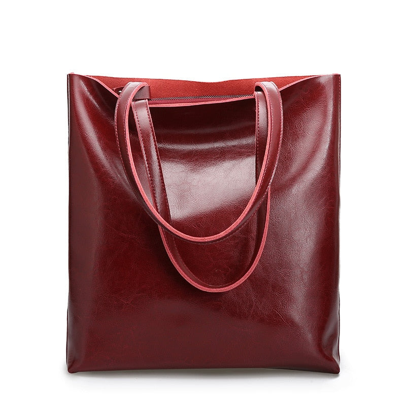 Élégant sac à main en cuir véritable pour femme, parfait accessoire quotidien.