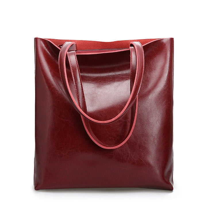 Élégant sac à main en cuir véritable pour femme, parfait accessoire quotidien.
