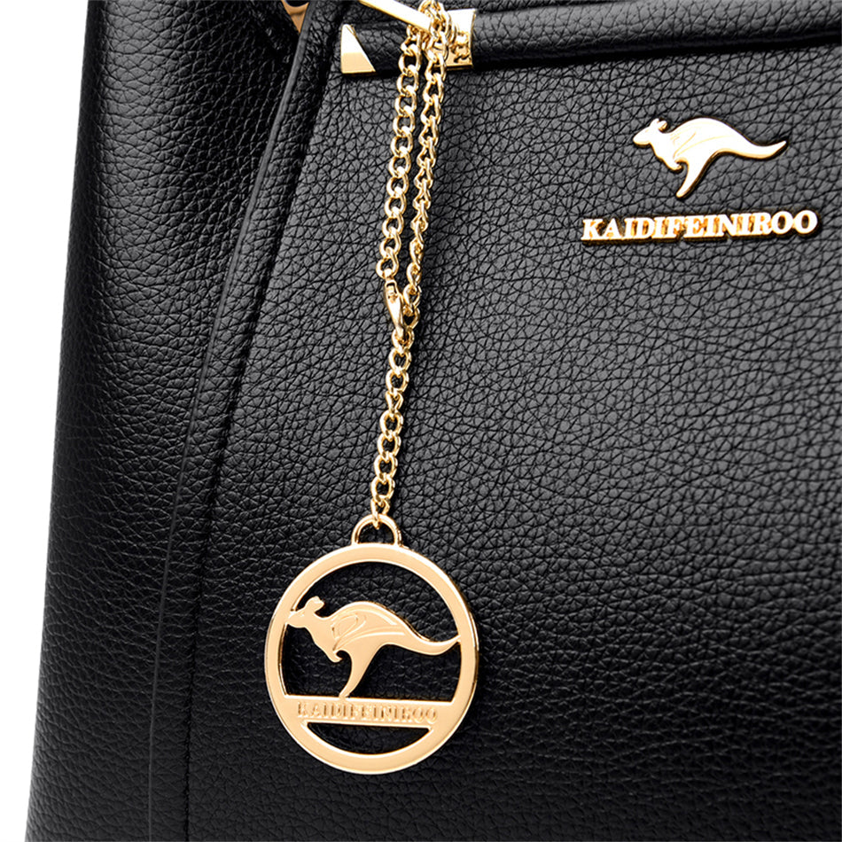 Sac bandoulière femme noir en cuir, grand et chic, un accessoire polyvalent pour toutes occasions.