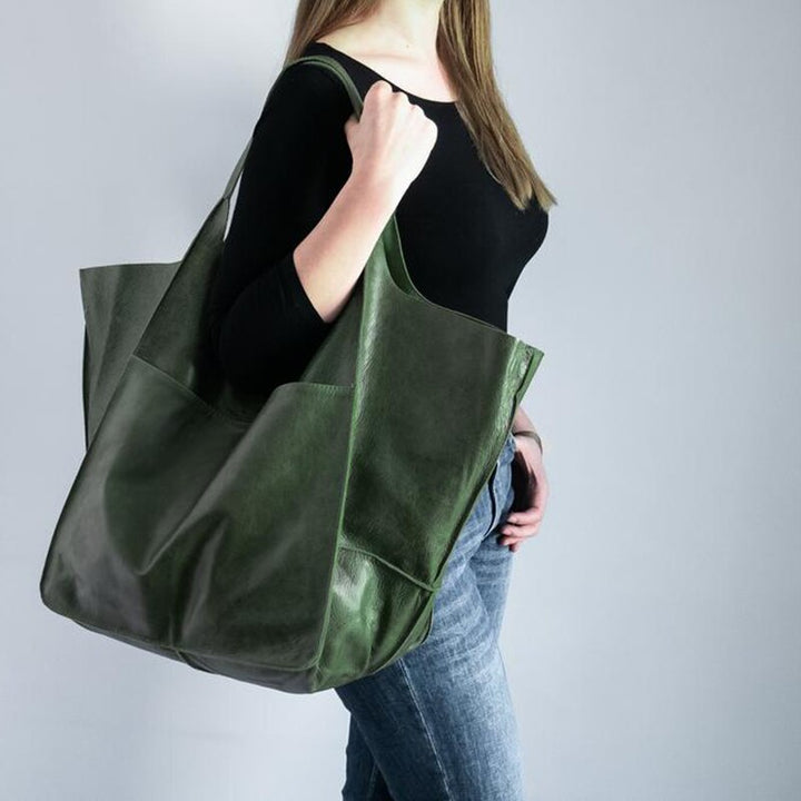 Sac épaule femme grand volume, en cuir PU, élégant et idéal pour transporter vos essentiels au quotidien.