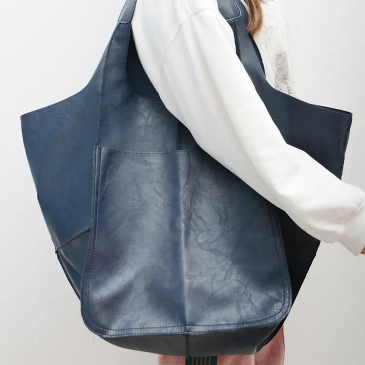 Sac à main femme élégant en cuir PU, style mode avec grand volume, un accessoire chic et polyvalent.