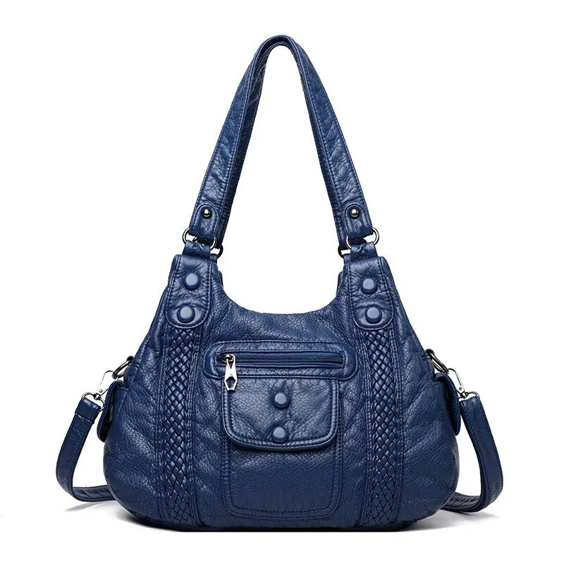 Sac à main femme élégant bleu canard en similicuir vieilli, style vintage. Parfait pour le quotidien chic.