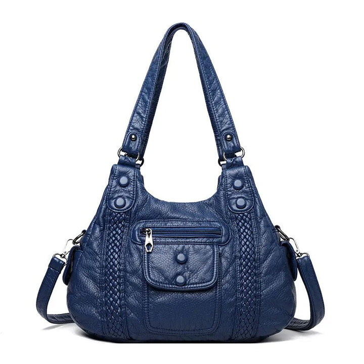 Sac à main femme élégant bleu canard en similicuir vieilli, style vintage. Parfait pour le quotidien chic.
