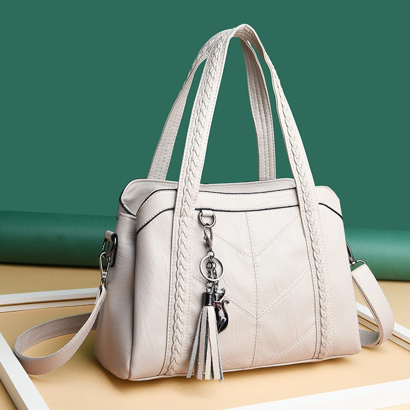 Sac à main femme élégant en cuir blanc, bandoulière fine, mode chic
