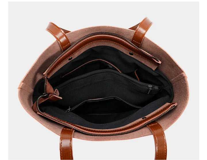 Sac cabas femme en cuir fendu, vue de côté montrant sa capacité spacieuse et son élégance.