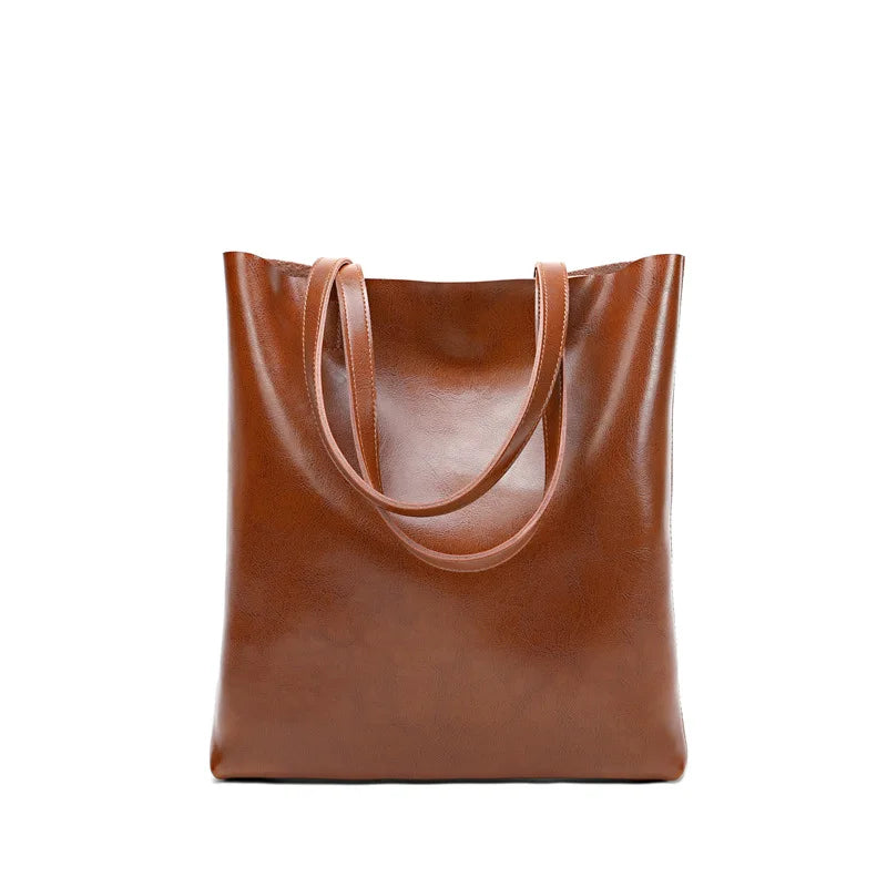 Sac cabas femme en cuir fendu, accessoire de mode chic et spacieux, parfait pour porté épaule.